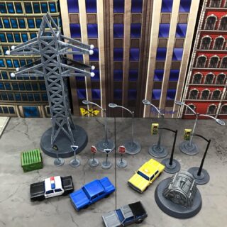 The City Accessories kit does give some life to the card city. For those that dont know, each of these accessories has am optional rule in game based on Bots of a certain base size being within 1” Streetlamp = Combat mace Streetsign = Combat axe Dumpster = Combat Shield Car = exchange RA for one auto hit at close range Pylon\ Turbine = Surge or power up Pretty fun 🙂 Be warned though. The streetlamps etc are a little fragile being tin. (Note: I also stuck my streetlamps on some washers for better stability). Www.tradersgalaxy.com.au #tabletopwargaming #tabletopminiatures #wargameminiature #miniaturewargames #tabletopgames #tabletop #botwar #tradersgalaxy #wargameminiature #wargameminiatures #skirmishwargames #spacemarines40k #40k #warhammer40k #tabletopwargaming #tabletopwargames #tabletopminiatures #wargames #tabletopgaming #battletechminiatures #robotech